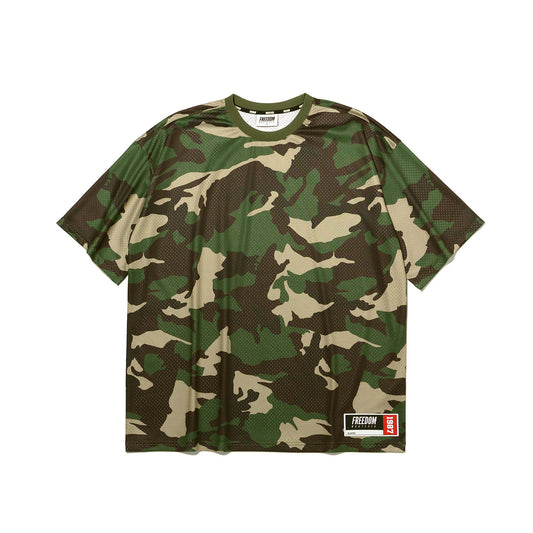 เสื้อยืดตาข่ายพิมพ์ลายด้านหลังขนาดโอเวอร์ไซส์ (ลายพรางอ่อน)