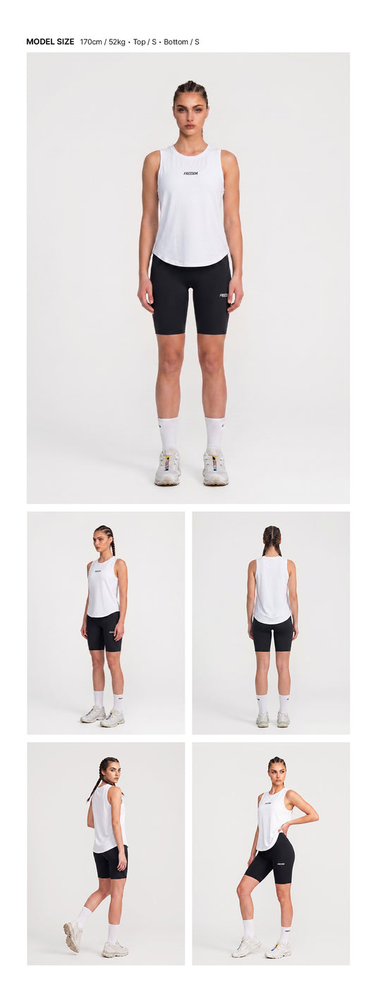 เสื้อกล้ามผู้หญิง Essential Active (สีขาว)