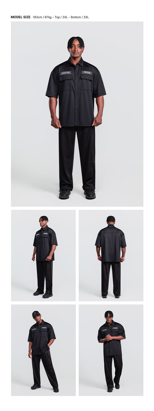 Wappen Mesh Short Sleeve Shirt (Black) — model wearing the outfit