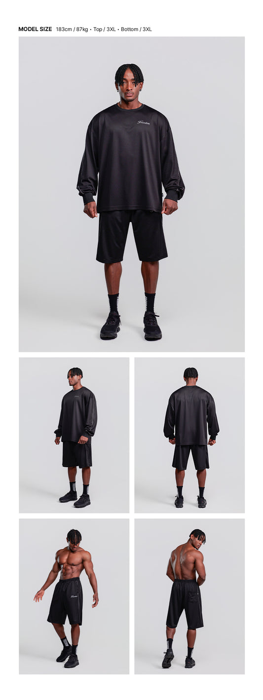 Sideline Mesh Bermuda Shorts (Black) — model wearing the outfit