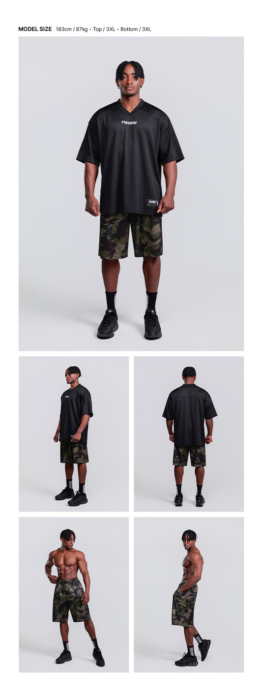Basic Mesh Bermuda Shorts (Deep Camo) — model wearing the outfit