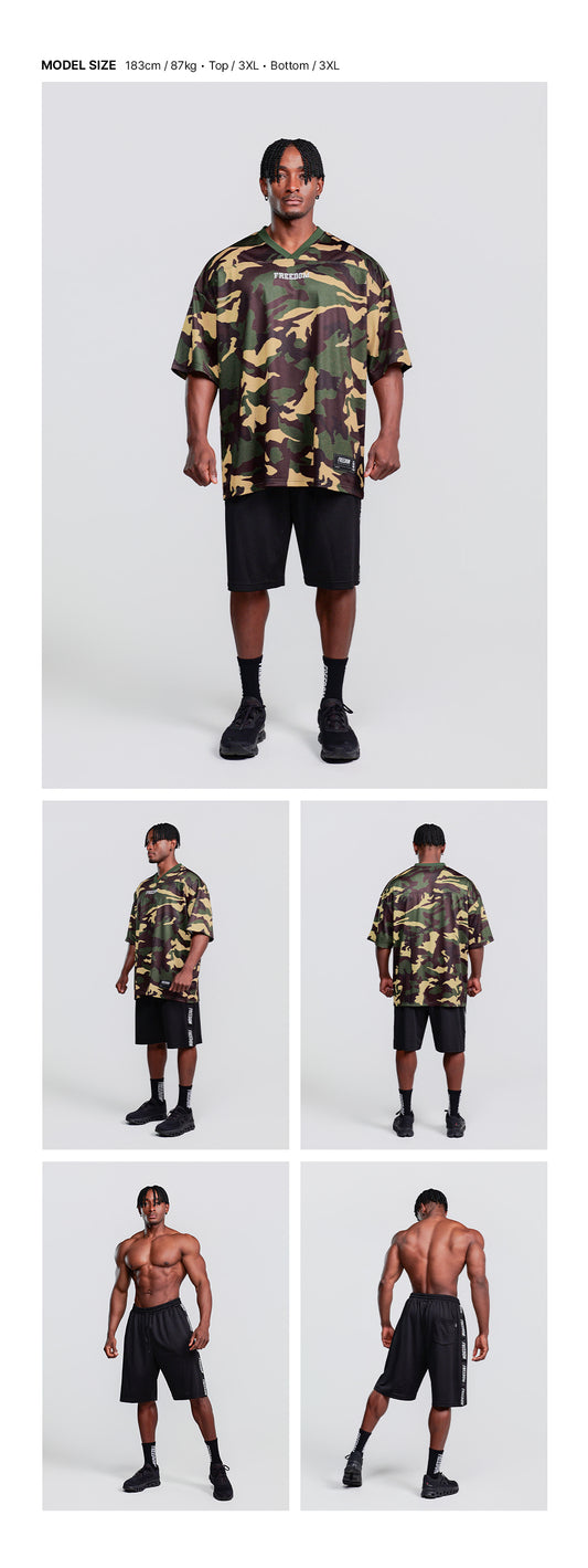 Entire Mesh Lettering Bermuda Shorts (Black) — model wearing the outfit