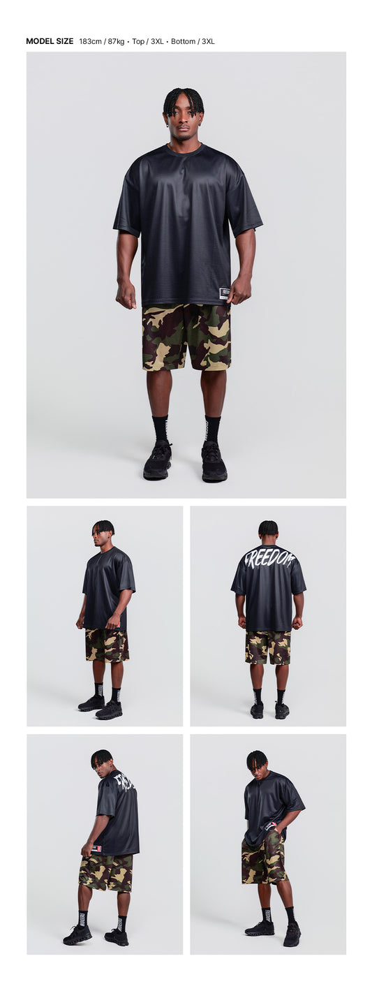 Mesh Oversized Back Print T-shirt (Black) — model wearing the outfit