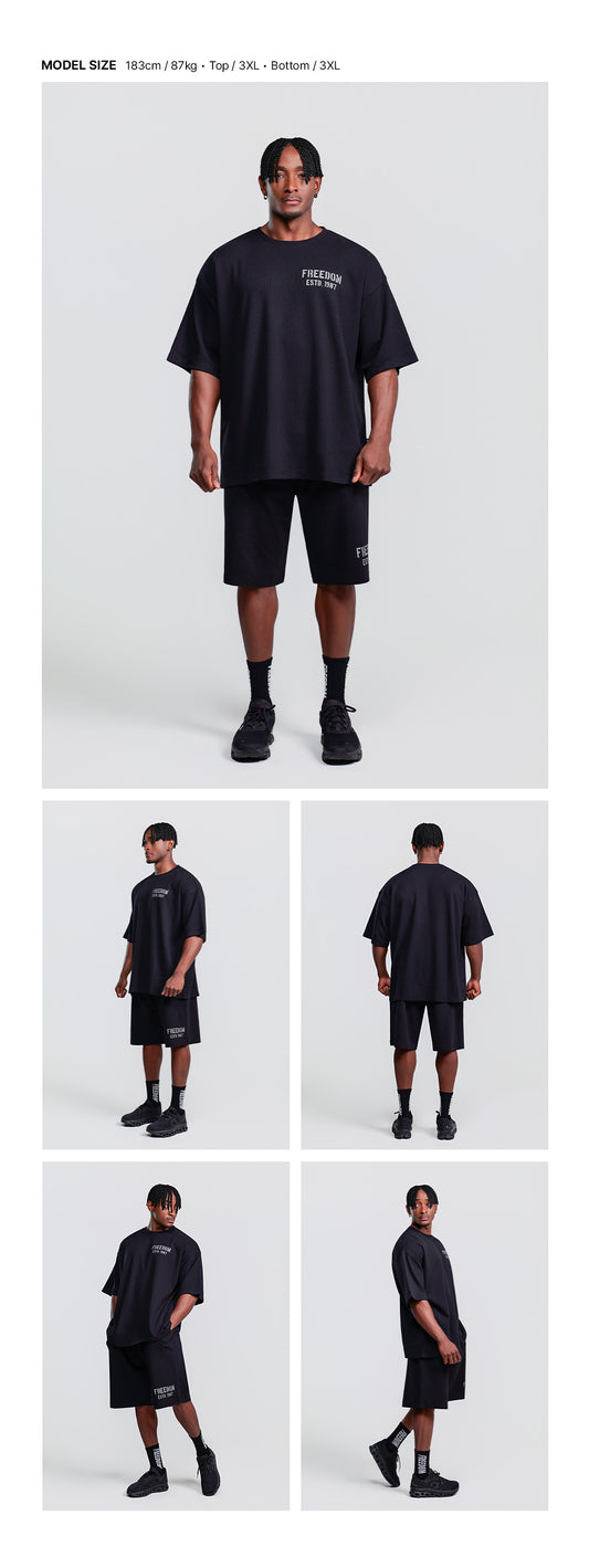 1987 Waffle Oversized T-shirt (Black) — model wearing the outfit