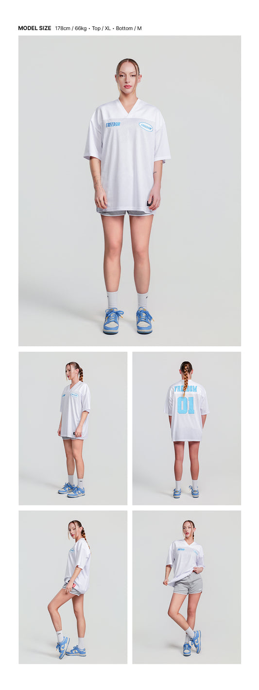 Women's Logo Yeezy Dolphin Shorts (Melange) — model wearing the outfit
