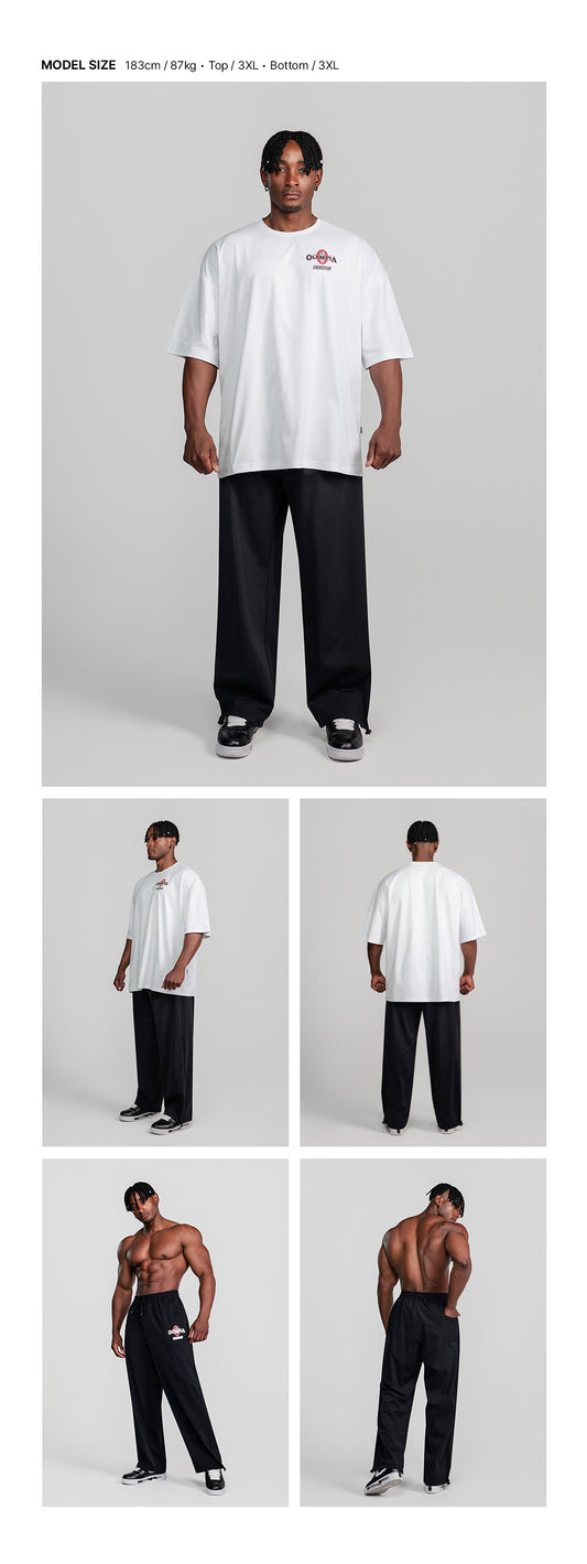 Olympia Essential Stretch Pants (Black) — model wearing the outfit